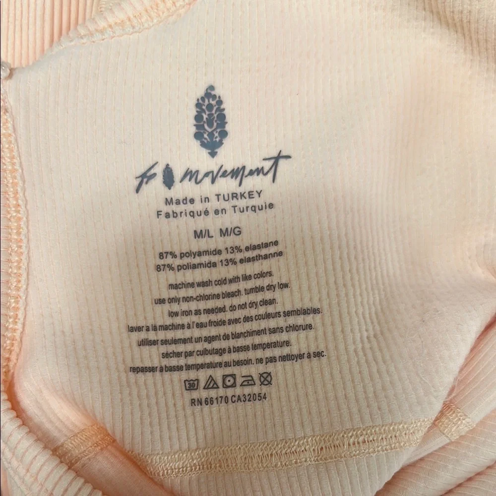 Free People Movement Good Karma Romper Peach Ribbed Cross Back Bodysuit M/L - Picture 6 of 8